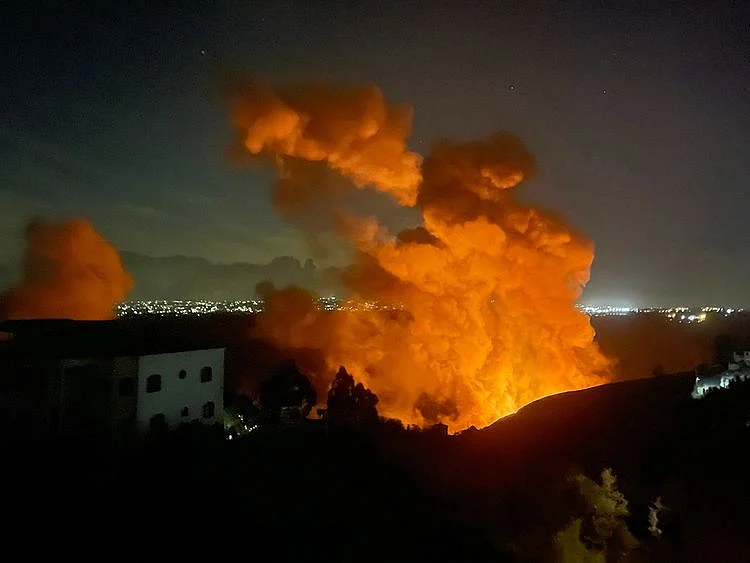Smoke billows at the site of an Israeli airstrike