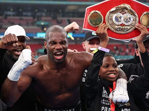 Britain's Daniel Dubois celebrates after defeating Britain's Anthony Joshua during their heavyweight boxing match for the IBF world title at Wembley Stadium in London on Saturday.