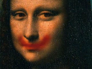Video: Lady Gaga plants lipstick smile on 'Mona Lisa' in Louvre clip