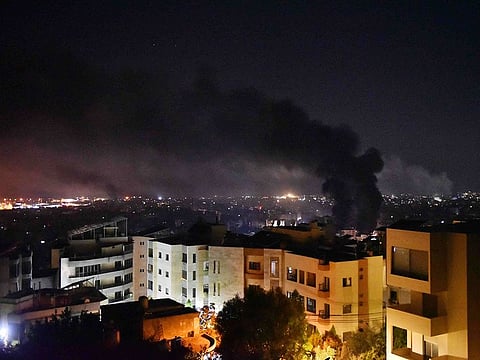 Smoke billows from the site of an Israeli airstrike that targeted a neighborrhood in Beirut’s southern suburb early on September 28, 2024. 