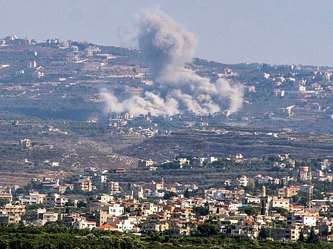 A smoke cloud erupts following an Israeil air strike on the village of Jbal el-Botm in southern Lebanon.