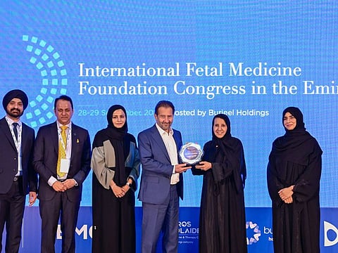 H E Dr Maitha bint Salem Al Shamsi, Dr Fayeza Saif Alyafei, Executive Director at DoH, and Dr Ghuwaya Al Neyadi, Non-Executive Board Member at Burjeel Holdings, felicitating Prof. Nicolaides