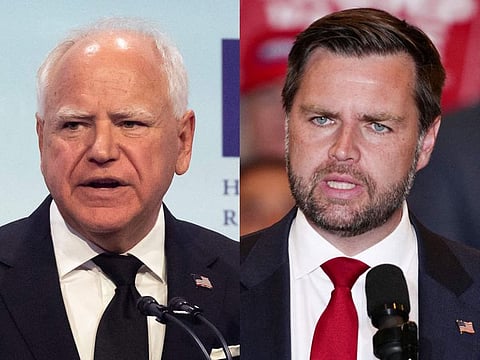  Minnesota Governor and Democratic vice-presidential candidate Tim Walz (left) and US Senator and Republican vice-presidential candidate J.D. Vance