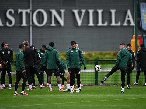Aston Villa players attend a training session on the eve of their Uefa Champions League 1st round day 2 football match against Bayern Munich, at Bodymoor Heath Training Ground in Warwickshire, central England, on Tuesday..