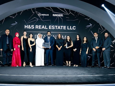 H&S Real Estate team receiving award