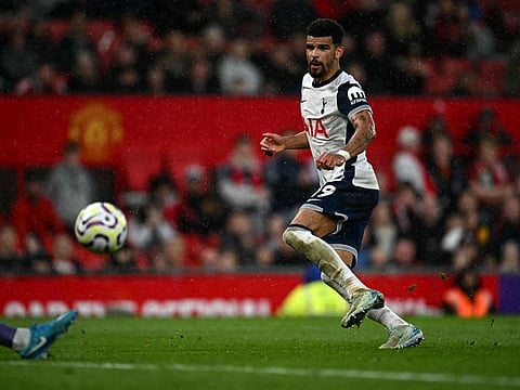 Tottenham Hotspur's English striker Dominic Solanke shoots but has the shot saved during the English Premier League football match against Tottenham Hotspur at Old Trafford in Manchester, north west England, on September 29.
