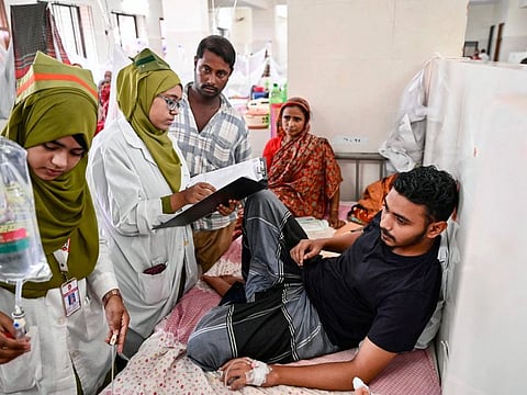 A dengue patient receives treatment at a hospital in Dhaka on September 28, 2024.  