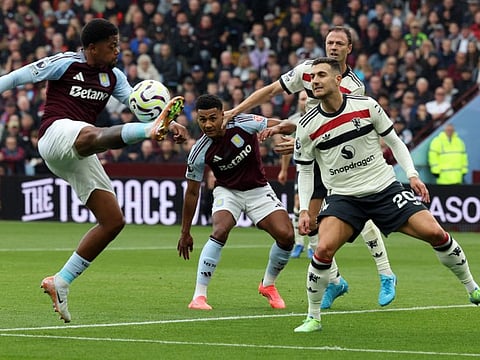Manchester United's Portuguese defender Diogo Dalot (right) vies with Aston Villa's Jamaican striker Leon Bailey during the English Premier League football match at Villa Park in Birmingham, central England on Sunday.