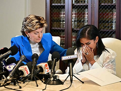 Attorney Gloria Allred (L) listens to Thalia Graves, an alleged victim of Rap mogul Sean Diddy Combs, during a press conference in Los Angeles on September 24, 2024. 
