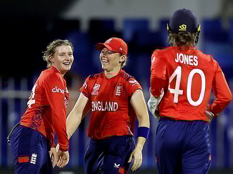 England players celebrate a South African wicket during the ICC T20 World Cup match at the Sharjah Cricket Stadium on Monday.