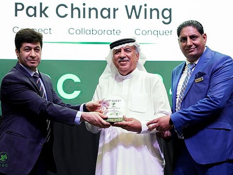 (From left) Pakistan Consul General Hussain Muhammad presenting shield to Mohammed Abdul Rahim Al Noori, an Emirati businessman the Chinar Business Conference in Dubai. Raja Amjad Kabir was also present. 