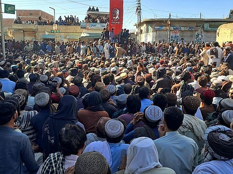 Labourers gather to protest against the killings of coal miners in an overnight attack in Duki district of Pakistan's southwestern Balochistan province on October 11, 2024.   