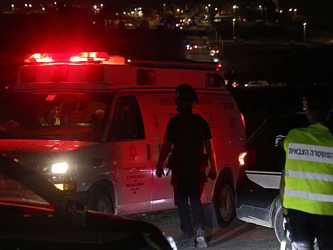 An ambulance leaves the scene of a drone strike near the northern Isareli town of Binyamina, on October 13, 2024. 