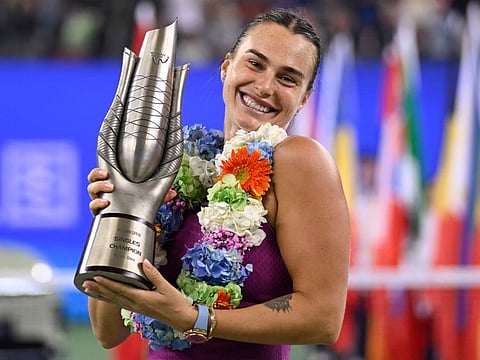 Belarus' Aryna Sabalenka poses with the trophy after winning the women's singles final against China's Zheng Qinwen at the Wuhan Open tennis tournament in Wuhan on Sunday.