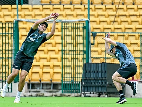 New Zealands Tim Southee (left) and captain Tom Latham attend a practice session ahead of their first Test cricket match against India, at the M Chinnaswamy Stadium in Bengaluru on Monday.
