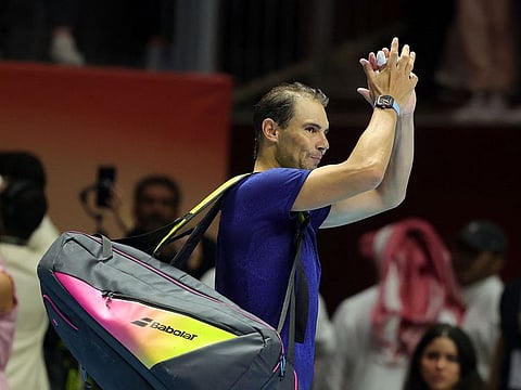 Spain's Rafael Nadal acknowledges the crowd after he was defeated by Spain's Carlos Alcaraz during their semi-final tennis match in the "6 Kings Slam" exhibition tournament in Riyadh on October 17, 2024.