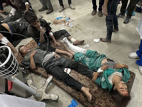  Wounded Palestinians receive treatment at the Kamal Adwan Hospital after an Israeli airstrike in Beit Lahia, in the northern Gaza Strip on October 19, 2024, amid the ongoing conflict between Israel and the Palestinian Hamas militant group. (Photo by Islam AHMED / AFP)