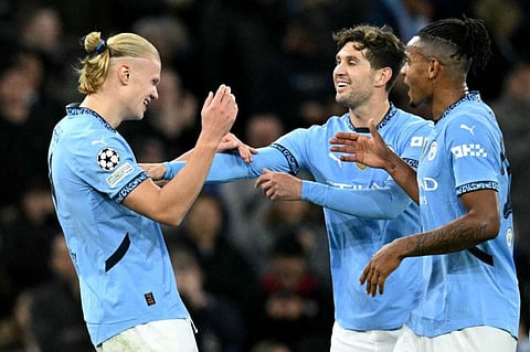 Manchester City's Norwegian striker Erling Haaland (left) celebrates scoring a goal during the Uefa Champions League football match against Sparta Prague at the Etihad Stadium in Manchester, north west England, on Wednesday.
