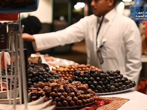 Visitors to the Medina Dates Season are drawn to the city's popular product and various activities of the event.  