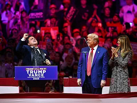 Former US President and Republican presidential candidate Donald Trump and his wife former US First Lady Melania Trump at Madison Square Garden in New York, October 27, 2024. 