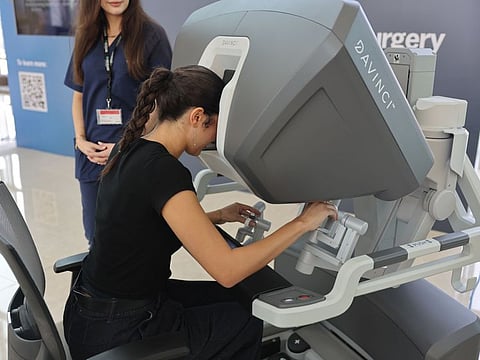 A student in a robotic surgery demonstration at Cleveland Clinic Abu Dhabi