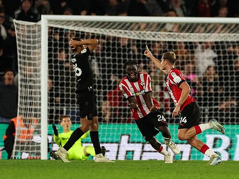 Southampton's James Bree (right) celebrates after scoring his team third goal during the English League Cup round of 16 match against Stoke City on Tuesday.