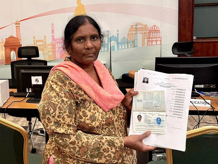 Eada-Ratna-Kumari-shows-her-documents-when-she-visited-the-Indian-Consulate-in-Dubai-on-Tuesday-1730305124807