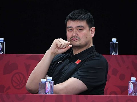 Chinese basketball icon Yao Ming watches the Basketball World Cup Group A game between Venezuela and China in Beijing on September 4, 2019.