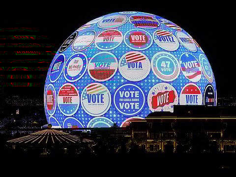 An advertisement for Democratic presidential nominee and US Vice President Kamala Harris and her running mate, Minnesota Gov. Tim Walz, is displayed on the 580,000-square-foot Exosphere at Sphere, the first political campaign to do so, on October 30, 2024 in Las Vegas, Nevada.