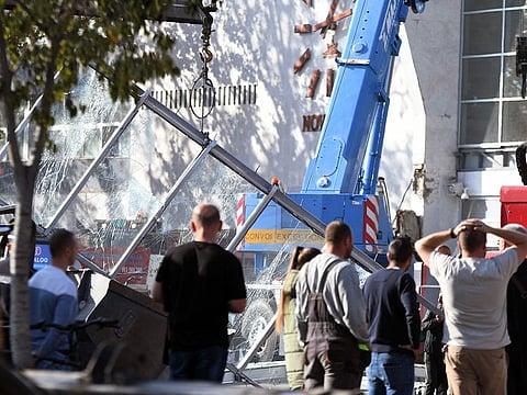 Emergency and rescue personnel work at the site where a concrete outdoor roof of a train station collapsed in the northern Serbian city of Novi Sad on November 1, 2024.   