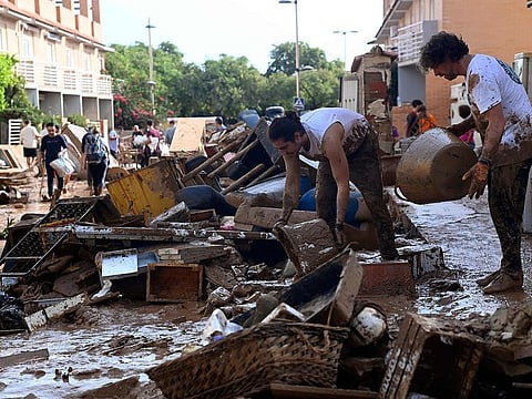 This picture taken on November 1, 2024 shows the devastating effects of flooding on a residential area in the town of Massanassa, in the region of Valencia, eastern Spain. 
