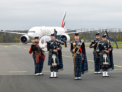The Emirates Boeing 777 was welcomed by the Royal Edinburgh Military Tattoo.