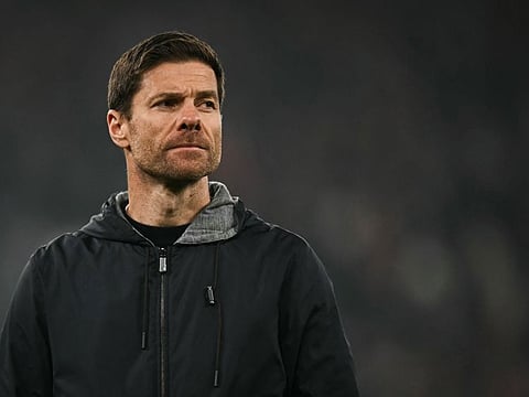 Bayer Leverkusen's Spanish head coach Xabi Alonso reacts at the end of the Uefa Champions League match against Liverpool at Anfield on Tuesday.