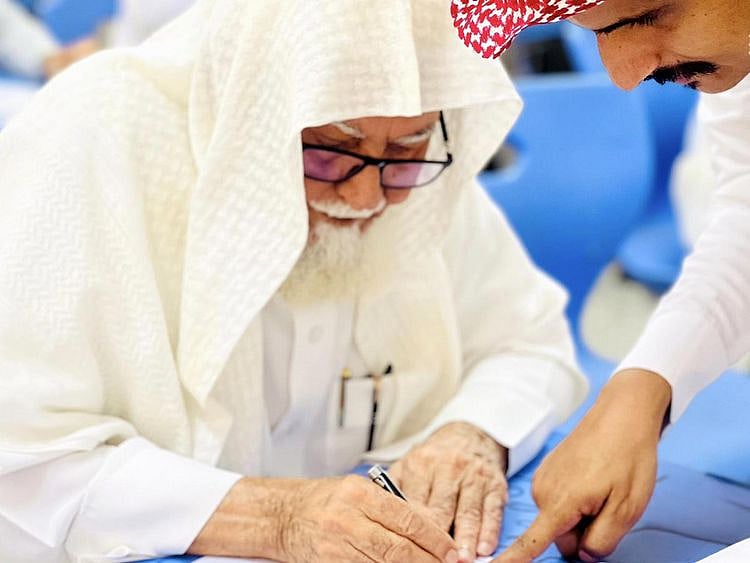 Amm Ali during an exam.  Take knowledge from the cradle to the grave, and from the inkwell to the tomb, he says.