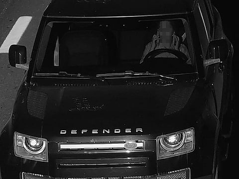 A motorist caught using two mobile phone simultaneously while driving in Dubai 