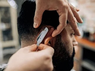 Barbershops in Saudi Arabia must meet new hygiene standards, including tool sterilization and permits for home services, to protect customer health.