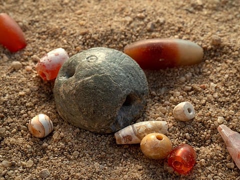 Artefacts such as pottery and stamps date the site to around 1900-1800 B.C., confirming its use during the early Dilmun period.