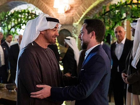 Sheikh Mohamed greets Hussein bin Abdullah, Crown Prince of Jordan during a dinner reception at Mangal restaurant.