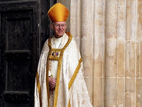 Archbishop of Canterbury Justin Welby smiles at Westminster Abbey in central London on May 6, 2023, ahead of the coronations of Britain's King Charles III and Britain's Camilla, Queen Consort. 