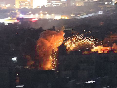 A ball of fire rises from the site of an Israeli airstrike that targeted a neighbourhood in Beirut's southern suburbs on November 13, 2024. 