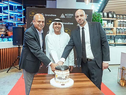 Dr Sadeddine Mneime, AGI Holding Chairman (right), Sheikh Salem bin Sultan AlQasimi, Chairman of the Department of Civil Aviation, Ras Al Khaimah (middle), and Manish Sabnis, CEO of Grandiose. 