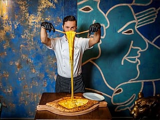 Indulge in Dubai's giant khachapuri: A cheesy Georgian delicacy