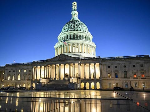 The US Capitol is seen at dusk in Washington
