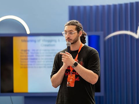 Palestinian content creator Faisal AlQedra, talking at the Sharjah International Book Fair