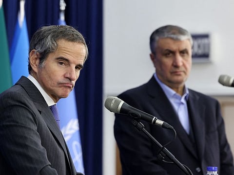 Iran's head of the Atomic Energy Organisation Mohammad Eslami (right), and the United Nations nuclear chief Rafael Grossi give a joint press conference in Tehran on November 14, 2024.  