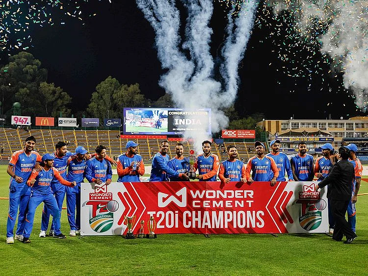 India players hold the trophy as they celebrate