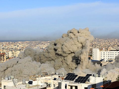 Thick smoke rises from an explosion during an Israeli airstrike that targeted a neighbourhood in Beirut’s southern suburbs.