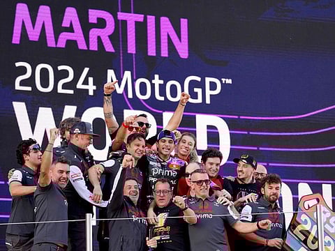 The new world champion Ducati Spanish rider Jorge Martin (centre) celebrates his title on the podium with the rest of his team after the MotoGP Solidarity Grand Prix of Barcelona at the Circuit de Catalunya on Sunday.