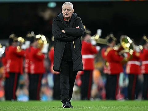 Wales' New Zealand head coach Warren Gatland checks out the conditions as the band plays ahead of the Autumn Nations Series International rugby union test match between Wales and Australia at the Principality Stadium, in Cardiff on November 17.