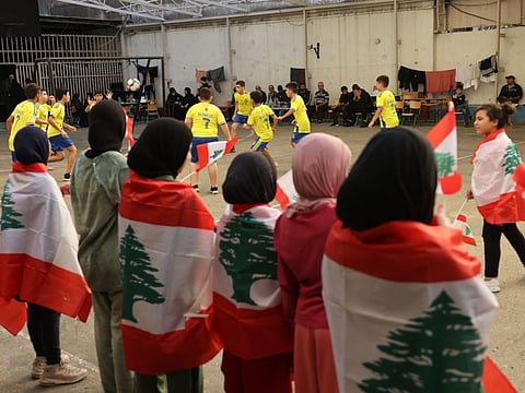 Children of displaced families take part in sports activities organised by civil society initiatives, at a public school in Beirut turned into a shelter for people fleeing Israeli bombardment on November 5, 2024.  